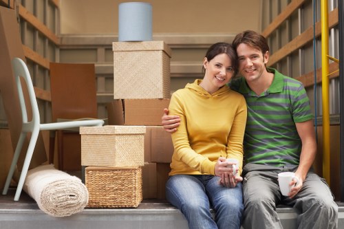 Professional movers handling office furniture in Westkensington