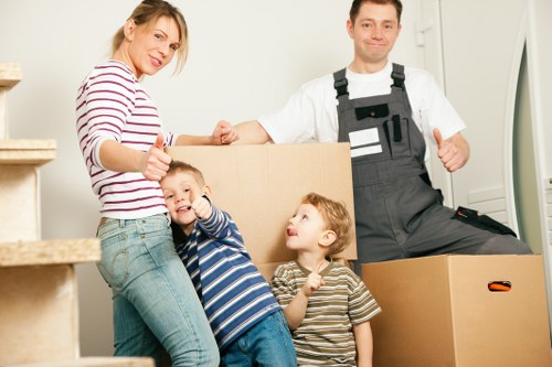 Manager reviewing a customer complaint in a removals office